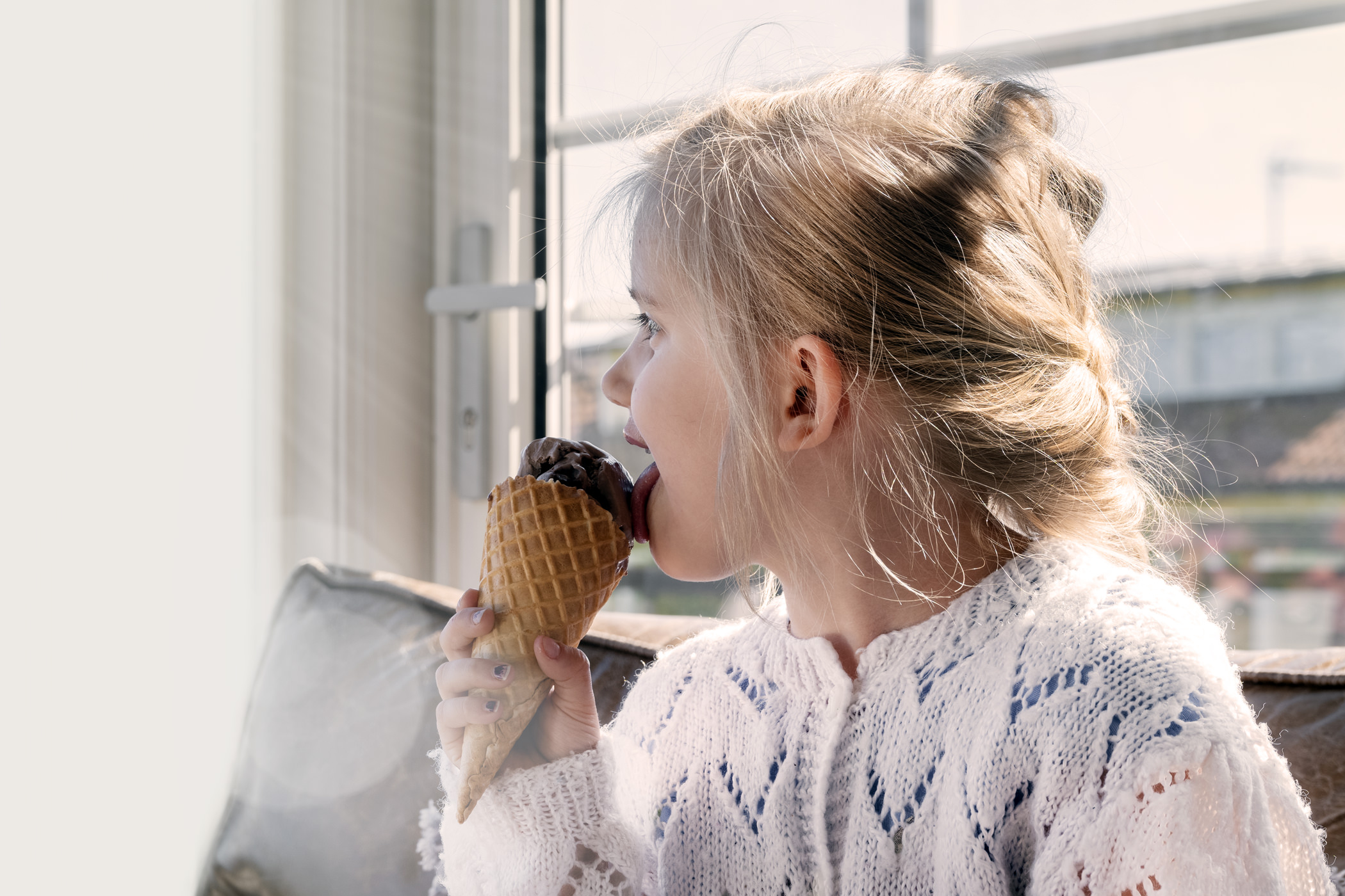 Girl eating ice cream at Hotel Furusund